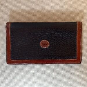 Dooney and Bourke Elegant Black and Brown Leather Wallet/checkbook